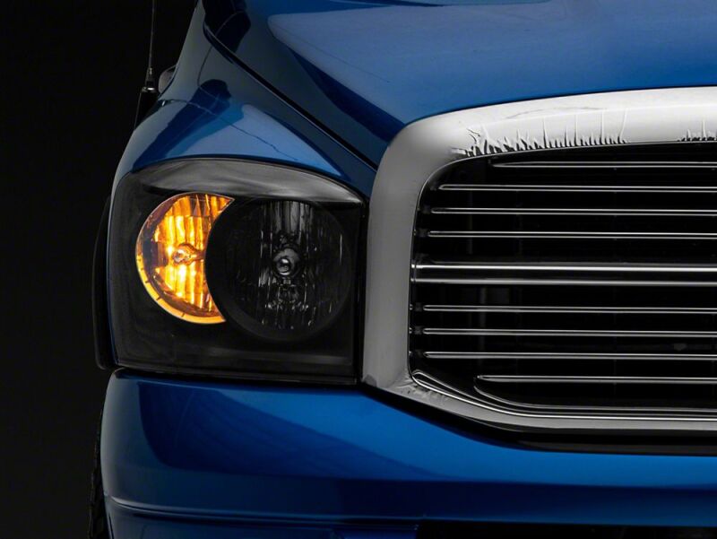 Raxiom 06-08 Dodge RAM 1500 Axial Series Euro Headlights- Black Housing- Clear Lens