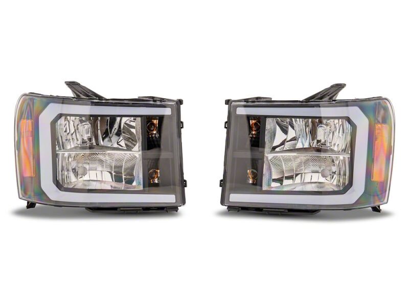 Raxiom 07-13 Chevrolet Sierra 1500 Axial Series Headlights/Seq LED Bar- Black- Clear Lens