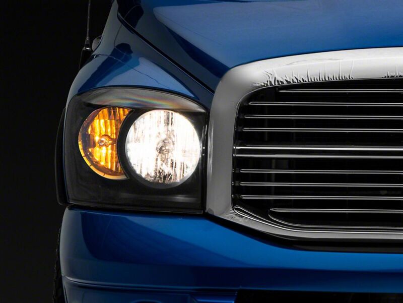 Raxiom 06-08 Dodge RAM 1500 Axial Series Euro Headlights- Black Housing- Clear Lens