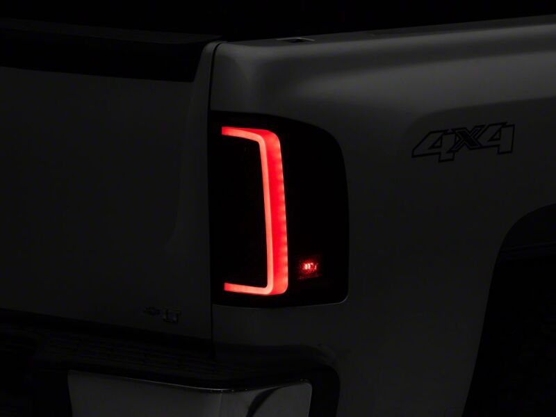 Raxiom 07-13 Chevrolet Silverado 1500 G2 LED Tail Lights- Black Housing- Smoked Lens